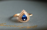 Blue Sapphire Teardrop Ring with Halo Diamonds - 18K White Gold