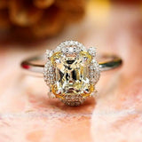 1.6ct Yellow Sapphire 18K Gold Ring with Halo Diamonds