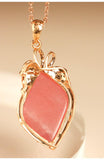 16.5ct Rhodochrosite 18K Yellow Gold Pendant with Diamonds