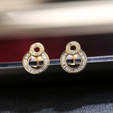 Circle Design Baguette White Diamond Earrings in 18K Yellow Gold