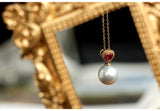 Ruby & 12mm South Sea Pearl Pendat in 18K Yellow Gold