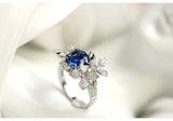 Flower Diamonds Ring with Blue Sapphire - 18K White Gold
