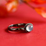 White Jade Cabochon Ring with Diamond Accents in 18K Black Gold