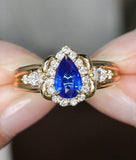 Cornflower Blue Sapphire Teardrop 18K Gold Ring with Diamonds