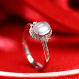 Icy Jade Cabochon & Diamond Halo Ring in 18K White Gold