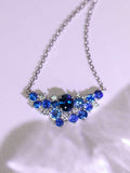 Blue Sapphire & Diamond Cluster Necklace in 18K White Gold