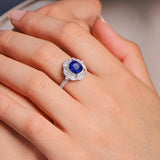 1.55ct Blue Sapphire 18K Gold Ring with Double Diamonds