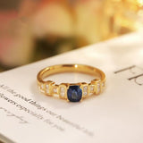 Art Deco Royal Sapphire Ring in 18K Gold with Princess-Cut Diamonds