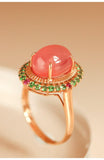 6.5ct Rhodochrosite Cabochon Cut & Halo Tourmaline Ring in 18K Gold