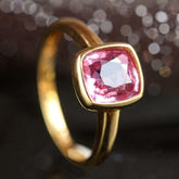 1.1ct Pinkish Cushion Bezal Set Ring in 18K Yellow Gold