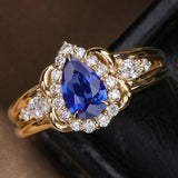 Cornflower Blue Sapphire Teardrop 18K Gold Ring with Diamonds
