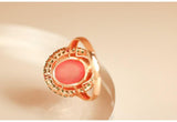 6.5ct Rhodochrosite Cabochon Cut & Halo Tourmaline Ring in 18K Gold