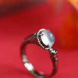White Jade Cabochon Ring with Diamond Accents in 18K Black Gold