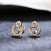 Circle Design Baguette White Diamond Earrings in 18K Yellow Gold