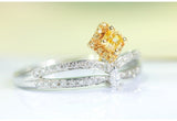 Fancy Yellow Diamonds Ring in 18K Two Tone Gold