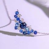 Blue Sapphire & Diamond Cluster Necklace in 18K White Gold
