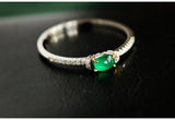 Emerald Oval Cabochon & Diamond Ring in 18K White Gold
