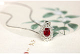 Vivid Red Ruby Oval & Diamonds Necklace in 18K White Gold