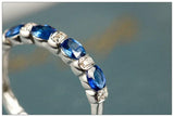 Four Blue Sapphire & Chaneel Diamond Ring in 18K White Gold