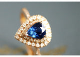Blue Sapphire Teardrop Ring with Halo Diamonds - 18K White Gold