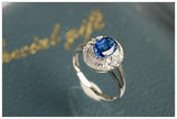 Blue Sapphire & Halo Diamonds Ring - 18K White Gold