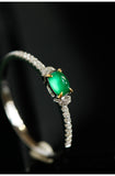 Emerald Oval Cabochon & Diamond Ring in 18K White Gold