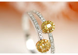 Two Fancy Yellow Diamonds Oval Ring in 18K Yellow Gold