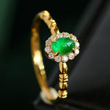 Cabochon Emerald & Halo Diamond Ring in 18K Yellow Gold