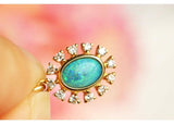 Opal & Halo Diamonds Pendant in 18K Yellow Gold