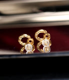 Circle Design Baguette White Diamond Earrings in 18K Yellow Gold