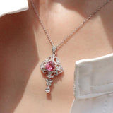 Pink Peach Sapphire Trillion Cut 18K Gold Pendant with Diamonds