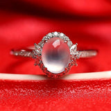 Icy Jade Cabochon & Diamond Halo Ring in 18K White Gold