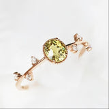 1.2ct Oval Mali Garnet & Diamond Cluster Ring in 18K Yellow Gold