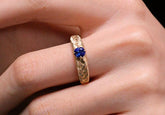 Brusheded Twisted 18K Gold Ring with Sapphire