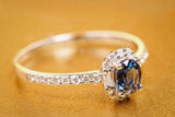 Blue Sapphire & Diamond Halo Ring - 18K White Gold