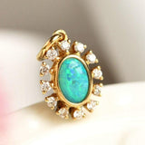 Opal & Halo Diamonds Pendant in 18K Yellow Gold