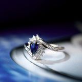 Vivid Blue Sapphire 18K Engagement Ring with Diamonds