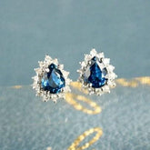 Blue Sapphire & Halo Diamond Studs in 18K White Gold