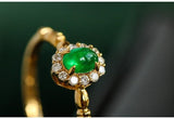 Cabochon Emerald & Halo Diamond Ring in 18K Yellow Gold
