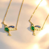 Hummingbird Emerald 18K Gold Necklace with Blue Sapphire