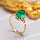 Cabochon Emerald & Halo Diamond Ring in 18K Yellow Gold