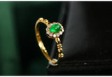 Cabochon Emerald & Halo Diamond Ring in 18K Yellow Gold