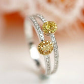 Two Fancy Yellow Diamonds Oval Ring in 18K Yellow Gold