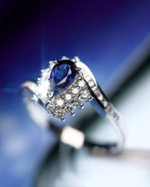 Vivid Blue Sapphire 18K Engagement Ring with Diamonds