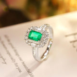 Emerald & Diamond Halo Pave Ring in 18K White Gold