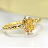 Fancy Yellow Diamonds Oval Ring in 18K Yellow Gold