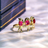 Three Bird Peach Red Spinel Cushion Ring in 18K Yellow Gold