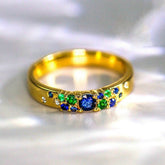 Blue Sapphire Tsavorite Cluster Band Ring in 18K Yellow Gold