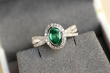 Emerald Oval Cut & Diamond Ring in 18K White Gold