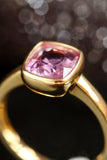 1.1ct Pinkish Cushion Bezal Set Ring in 18K Yellow Gold